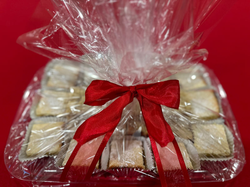Elevate your order with our Gift Presentation—ideal for events, celebrations, and thoughtful gifts. 

Your order will be beautifully arranged on a display tray, wrapped in clear cellophane, and finished with a coordinating bow.

Only an additional $8 to each product ordered. 